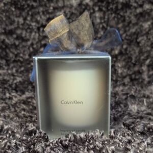 Calvin Klein Frosted Candle with Blue/Gold Ribbon